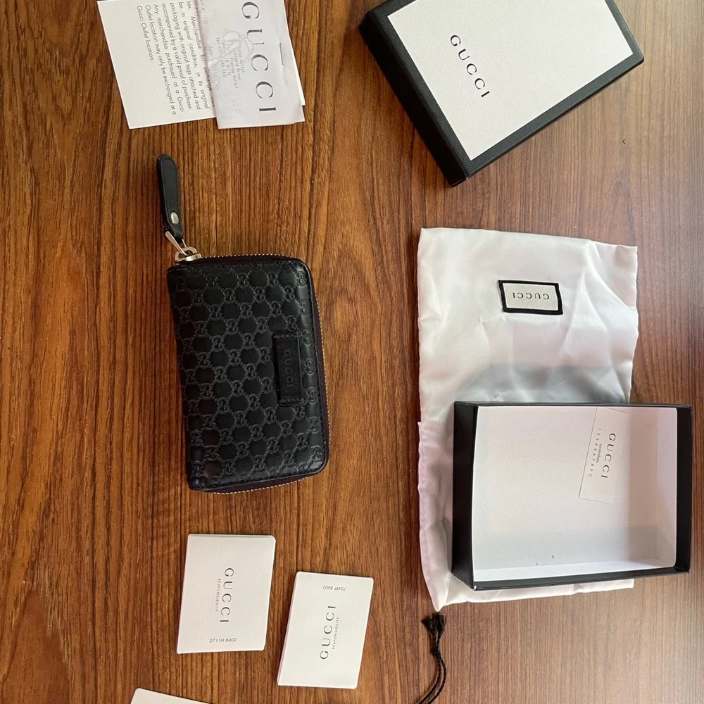 Gucci Black Embossed Leather Pouch - Picture 2 of 7